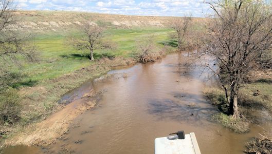 154 cfs at Smoky Hill River at Pfeifer, KS on Apr. 21, 2016. Photo by Andrew Clark, USGS.