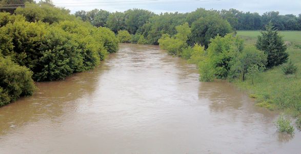 5,140 cfs at Smoky Hill River near Mentor, KS on July 30, 2013. Photo by Travis See, USGS.