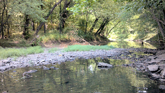 0.13 cfs at Blue River at Kenneth Rd, Overland Park, KS on July 11, 2012. Photo by Anita Kroska, USGS.