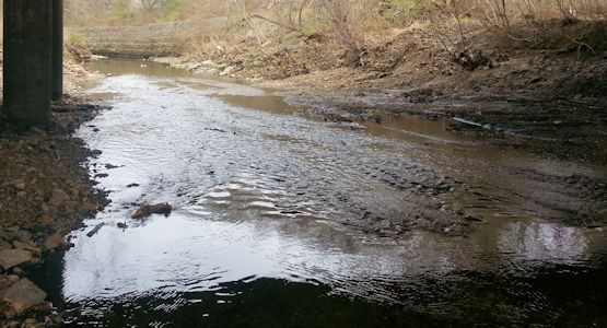 5.08 cfs at Tomahawk Creek near Overland Park, KS on Apr. 10, 2014. Photo by Craig Davies, USGS.