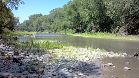 90 cfs at Marais des Cygnes River at La Cygne, KS on July 24, 2012. Photo by Anita Kroska, USGS.