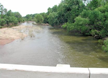 75.5 cfs at Arkansas River near Nickerson, KS on Apr. 26, 2012. Photo by Mike Holt, USGS.