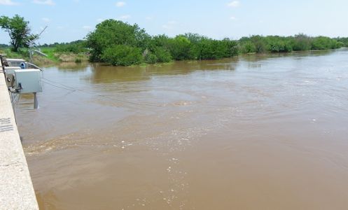 13,600 cfs at Little Arkansas River near Sedgwick, KS on July 30, 2013. Photo by Trudy Bennett, USGS.