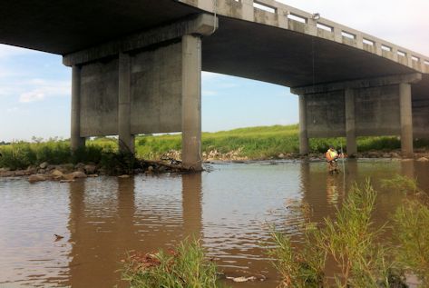 50 cfs at Floodway at Little Arkansas River at Valley Center, KS on Aug. 7, 2015. Photo by Chris Moehring, USGS.
