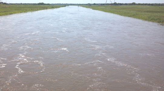7,280 cfs at Floodway at Arkansas River at Wichita, KS on July 31, 2013. Photo by Mike Holt, USGS.