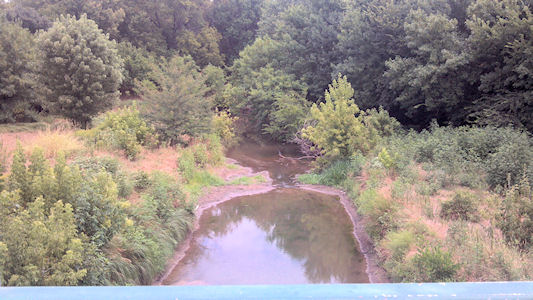 0.67 cfs at Cowskin Creek at 119th Street at Wichita, KS on July 31, 2012. Photo by Sonja McDanel, USGS.