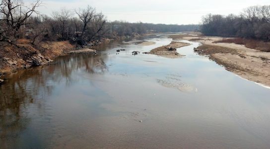 105 cfs at Arkansas River at Derby, KS on Jan. 25, 2013. Photo by Slade Hackney, USGS.