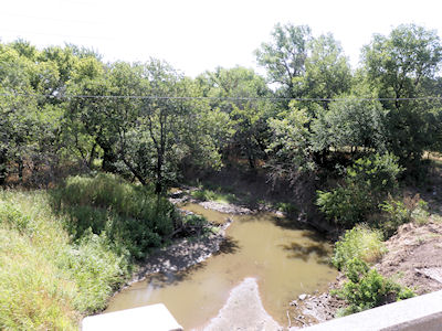 0.28 cfs at Slate Creek at Wellington, KS on July 24, 2012. Photo by Chris Moehring, USGS.