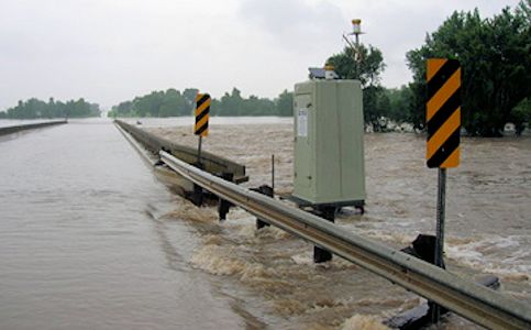 69,700 cfs at Fall River at Fredonia, KS on June 30, 2007. Photo by Dirk Hargadine, USGS.